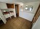 Bedroom features built-in drawers and closet for ample storage at 10315 Cortez W Rd # 18D, Bradenton, FL 34210