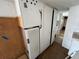 Hallway providing access to bedrooms and living spaces at 10315 Cortez W Rd # 18D, Bradenton, FL 34210