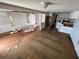 Spacious combined living and kitchen area with natural light ready for renovation at 10315 Cortez W Rd # 18D, Bradenton, FL 34210