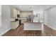 Bright kitchen featuring stainless steel appliances, granite countertops, and ample cabinet space at 3027 W Spruce St, Tampa, FL 33607