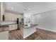 Modern kitchen featuring a large island with granite countertops and stainless steel appliances at 3027 W Spruce St, Tampa, FL 33607