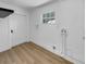 Bright basement with durable flooring and white walls, ready to be transformed into your ideal space at 3410 Grove Street Cir, Tampa, FL 33610