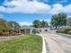 Charming single-story home featuring a well-manicured front yard and inviting carport at 3410 Grove Street Cir, Tampa, FL 33610
