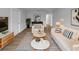 Bright living room boasts stylish furnishings, modern decor, and hardwood flooring at 3410 Grove Street Cir, Tampa, FL 33610