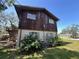 The home has wood and stucco siding with landscaping at 359 S Orchid Dr, Ellenton, FL 34222