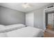 Bright bedroom with a ceiling fan, closet, and two beds, ideal for Gathering or guests at 3926 Helena Ne St, St Petersburg, FL 33703