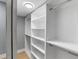This spacious closet includes shelving, rods, and plenty of storage at 3926 Helena Ne St, St Petersburg, FL 33703