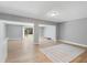 Spacious open-concept living area with natural light and modern flooring, perfect for entertaining and relaxing at 3926 Helena Ne St, St Petersburg, FL 33703