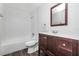 Bathroom featuring a vanity, toilet, and bathtub/shower combination at 6426 Eden Ln, Tampa, FL 33634