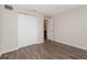 Bedroom with a closet and a door leading to another room at 6426 Eden Ln, Tampa, FL 33634