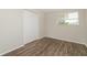 Cozy bedroom with a closet and a window offering natural light at 6426 Eden Ln, Tampa, FL 33634