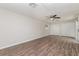 Bright bedroom with updated flooring, neutral walls, and closet space for efficient storage at 6426 Eden Ln, Tampa, FL 33634
