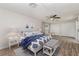 Serene bedroom with matching nightstands, comfortable seating, and ample closet space for all your storage needs at 6426 Eden Ln, Tampa, FL 33634