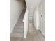 Interior view of a carpeted staircase leading to the upper level of the home at 7288 Deer Valley Circle, Tampa, FL 33635