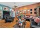 Inviting living room with hardwood floors, large seating area and cozy decor at 14680 Linden Dr, Spring Hill, FL 34609
