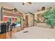 Bright main bedroom features a sliding door to the pool area and an en-suite bathroom at 14680 Linden Dr, Spring Hill, FL 34609
