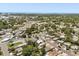 An aerial view of a neighborhood with lush green trees at 1465 Pierce St, Clearwater, FL 33755