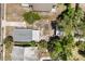 Aerial view of the back of a home with a detached structure at 1465 Pierce St, Clearwater, FL 33755