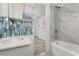 Updated bathroom with modern fixtures, new tile, and a stylish vanity at 1465 Pierce St, Clearwater, FL 33755