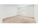 Bright bedroom with large window and neutral carpet at 5329 Companion Ln, Tampa, FL 33619