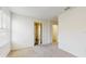 Bedroom with neutral carpet and multiple doorways at 5329 Companion Ln, Tampa, FL 33619