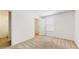Carpeted bedroom with attached closet and large window at 5329 Companion Ln, Tampa, FL 33619
