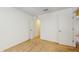 Bright bedroom featuring a neutral carpet, white walls, and an open closet at 5329 Companion Ln, Tampa, FL 33619