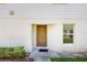 Charming front entrance featuring a modern door, window and small garden at 5329 Companion Ln, Tampa, FL 33619