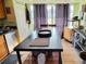 Practical kitchen featuring an island and modern appliances, complemented by abundant natural light at 4419 Waltham Dr, Tampa, FL 33634