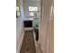 The laundry room features a new washer and dryer with a decorative rug and an adjacent closet at 8252 Tecumseh Cir, Port Charlotte, FL 33981