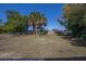 Spacious backyard with a chain-link fence, offering ample room for outdoor activities at 9235 Richwood Ln, Port Richey, FL 34668