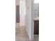 Bathroom featuring a sleek vanity, medicine cabinet and modern fixtures at 9235 Richwood Ln, Port Richey, FL 34668