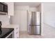 The kitchen features stainless steel appliances at 9235 Richwood Ln, Port Richey, FL 34668