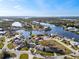 Breathtaking aerial view of the canal community, highlighting the waterfront lifestyle at 105 12Th Sw St, Ruskin, FL 33570