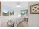 Bright bedroom featuring windows and neutral decor at 105 12Th Sw St, Ruskin, FL 33570