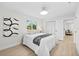Bright bedroom with clean lines and modern decor, creating a relaxing space at 105 12Th Sw St, Ruskin, FL 33570
