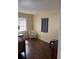 Bedroom with hardwood flooring and natural light at 1317 W Alicia Ave, Tampa, FL 33604