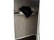 Small reach-in closet with wire shelving, perfect for basic storage needs and staying organized at 1317 W Alicia Ave, Tampa, FL 33604