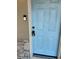 A welcoming front door with modern doorbell at 1317 W Alicia Ave, Tampa, FL 33604