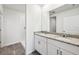 Modern bathroom with dual sinks, granite countertops, and a walk-in shower at 14005 Crutchfield Ct, Parrish, FL 34219