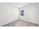 Cozy bedroom with neutral carpet, white walls, and a window with blinds at 14005 Crutchfield Ct, Parrish, FL 34219