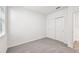 This is a bedroom with neutral carpet, a window and a closet with sliding doors at 14005 Crutchfield Ct, Parrish, FL 34219