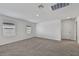 Spacious bedroom with neutral walls, carpeting, and abundant natural light provided by two large windows at 14076 Crutchfield Ct, Parrish, FL 34219