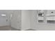 Bright entryway with tile flooring, a closet, and a view of the staircase at 14076 Crutchfield Ct, Parrish, FL 34219