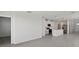 Open concept living area showcasing the kitchen, dining, and entry to the home at 14076 Crutchfield Ct, Parrish, FL 34219