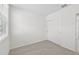Clean bedroom featuring carpet, window, and a closet with sliding doors at 14115 Crutchfield Ct, Parrish, FL 34219