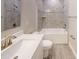 This bathroom features a shower and bathtub, a tile backsplash, and a vanity sink at 2277 Broadpoint Dr, Punta Gorda, FL 33983