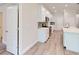 Modern kitchen with white cabinets, stainless steel appliances, and a center island at 2277 Broadpoint Dr, Punta Gorda, FL 33983
