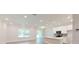 Bright and open living space with recessed lighting and a modern kitchen at 2277 Broadpoint Dr, Punta Gorda, FL 33983