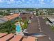 Aerial view showcasing the community's pool, landscaping, and colorful building exteriors at 2411 W Horatio St # 537, Tampa, FL 33609